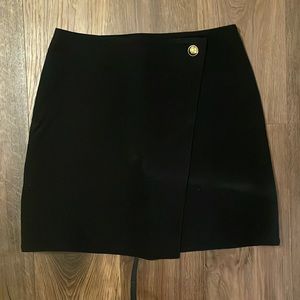 Black skirt with gold button detail
